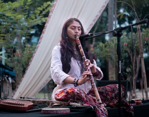 Wellness vendors and partners collaborating at FlowFest